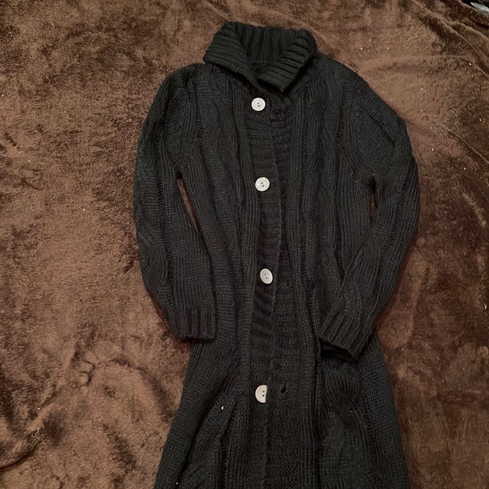Black sweater coat size large. Never work without tags.